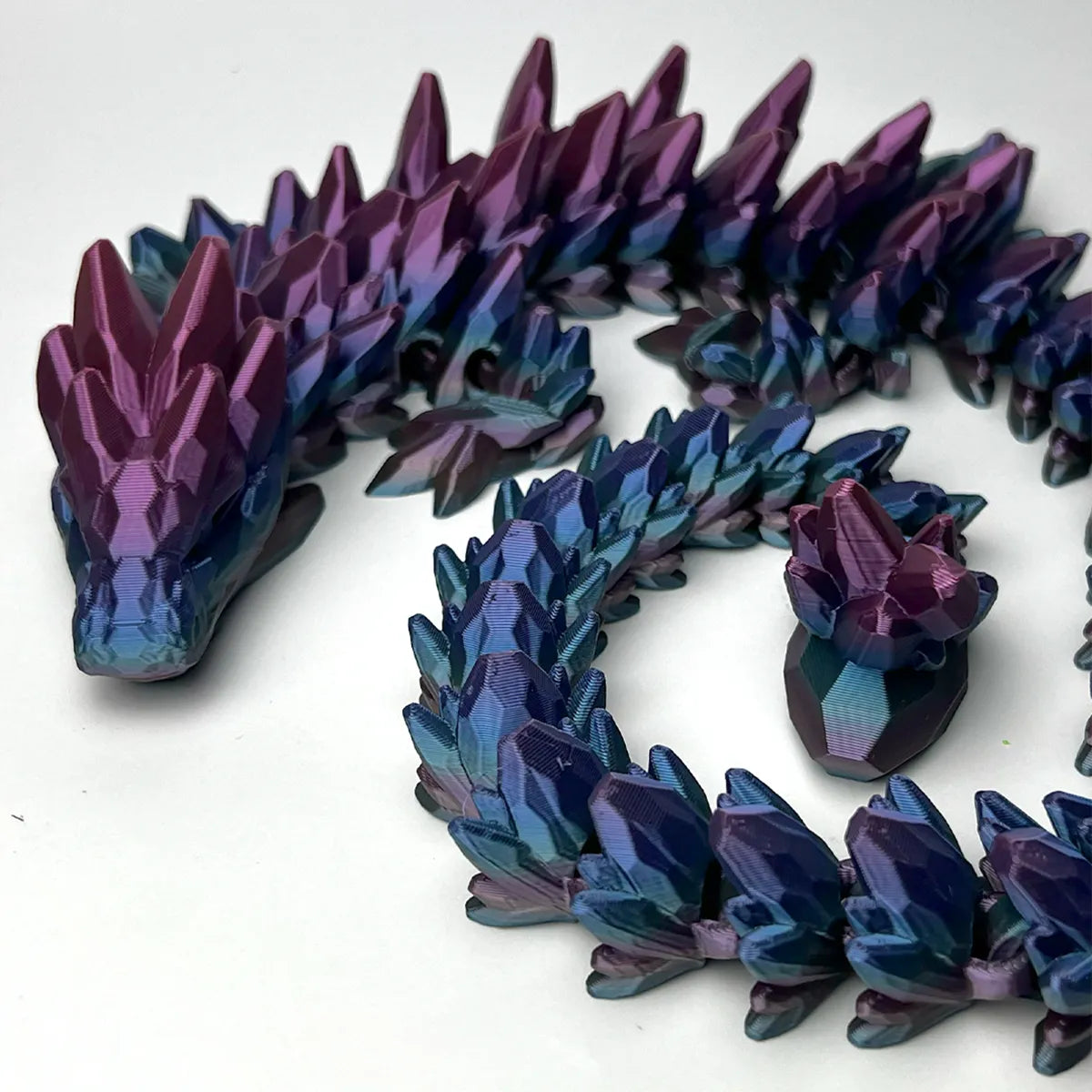 Gemstone Articulated Dragon showing jewel-tone scales and flexible body