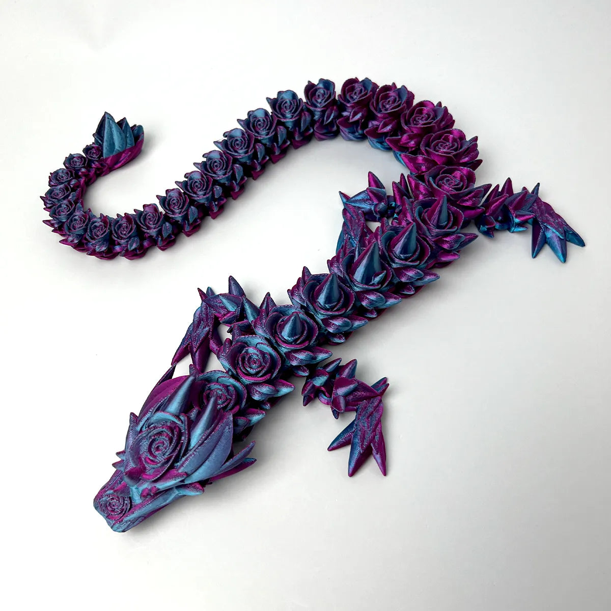 Rose Dragon Articulated Fidget posed showing articulated joints